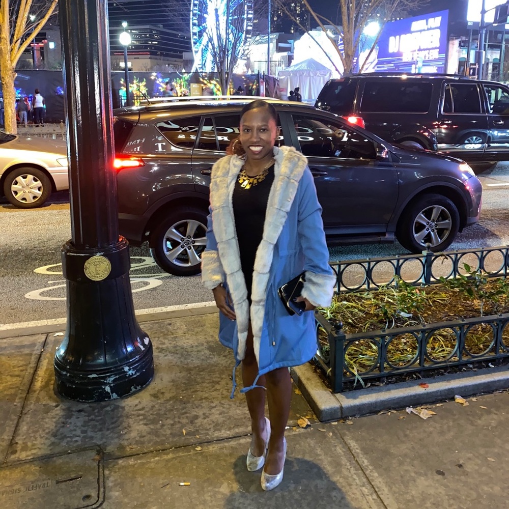 Hooded fur coat